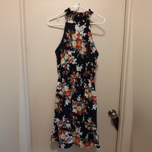 Navy halter dress, floral pattern.